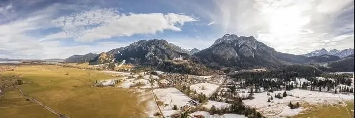 Framed Print : Aerial panorama drone shot of picturesque Neuschwanstein Castle on snowy hill in winter sunlight in Germany Framed Print : Aerial panorama drone shot of picturesque Neuschwanstein Castle on snowy hill in winter sunlight in Germany