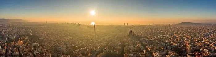 Framed Print : Aerial panorama drone shot of skyline in Barcelona center in misty morning foggy sunrise golden glow in Spain winter Framed Print : Aerial panorama drone shot of skyline in Barcelona center in misty morning foggy sunrise golden glow in Spain winter