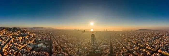 Framed Print : Aerial panorama drone shot of skyline in Barcelona city center in foggy sunrise golden hour in Spain winter Framed Print : Aerial panorama drone shot of skyline in Barcelona city center in foggy sunrise golden hour in Spain winter