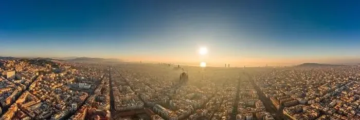 Framed Print : Aerial panorama drone shot of skyline in Barcelona city center in foggy sunrise golden hour in Spain winter Framed Print : Aerial panorama drone shot of skyline in Barcelona city center in foggy sunrise golden hour in Spain winter