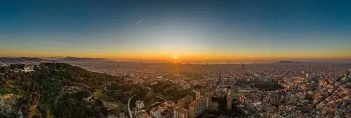 Framed Print : Aerial panorama drone shot of sunrise over sea horizon of Barcelona city in Spain winter dawn Framed Print : Aerial panorama drone shot of sunrise over sea horizon of Barcelona city in Spain winter dawn
