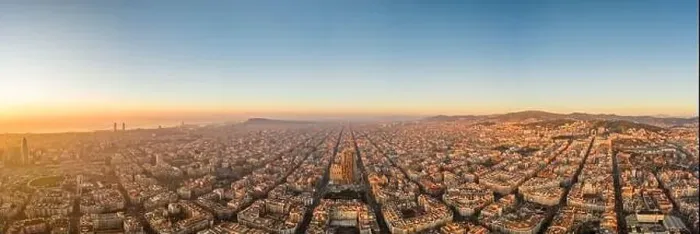 Framed Print : Aerial panorama drone shot of sunrise over sea horizon of Barcelona city in Spain winter dawn Framed Print : Aerial panorama drone shot of sunrise over sea horizon of Barcelona city in Spain winter dawn