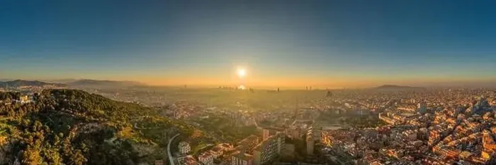 Framed Print : Aerial panorama drone shot of sunrise over sea horizon of Barcelona city in Spain winter dawn Framed Print : Aerial panorama drone shot of sunrise over sea horizon of Barcelona city in Spain winter dawn