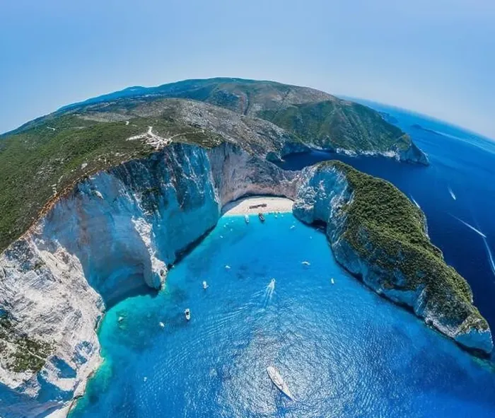 Framed Print : Aerial panorama drone shot of Zakynthos Navagio beach with cliffs and yachts in Ionian sea Framed Print : Aerial panorama drone shot of Zakynthos Navagio beach with cliffs and yachts in Ionian sea