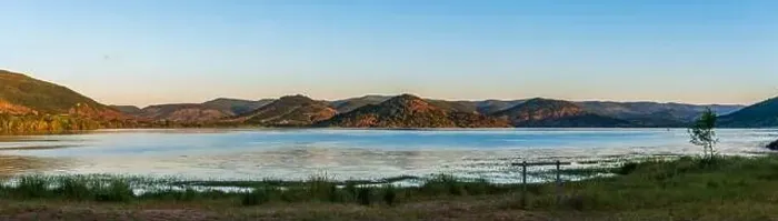 Framed Print : Aerial panorama of Lac du Salagou in the early morning in summer in Hérault in Occitania, France Framed Print : Aerial panorama of Lac du Salagou in the early morning in summer in Hérault in Occitania, France