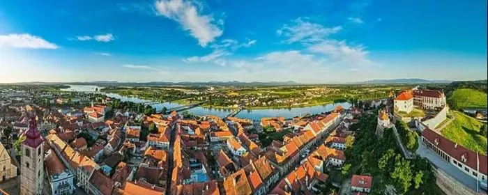 Framed Print : Aerial Panorama over Ptuj Townscape, Ptuj Castle and River Drava in Slovenia Framed Print : Aerial Panorama over Ptuj Townscape, Ptuj Castle and River Drava in Slovenia