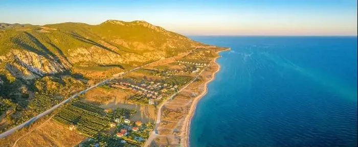 Framed Print : Aerial panorama of a small Greek village on the coast of the Mediterranean sea