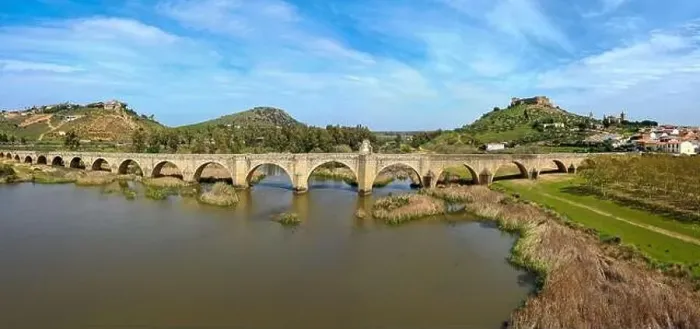 Framed Print : Aerial panorama view of the Guadiana River and the town of Medellin with old bridge and castle Framed Print : Aerial panorama view of the Guadiana River and the town of Medellin with old bridge and castle