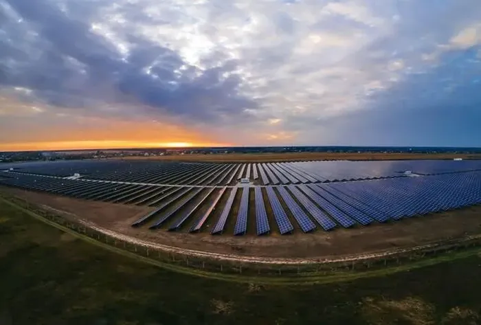 Framed Print : Aerial panorama view of large solar panels at a solar farm at bright summer sunset Framed Print : Aerial panorama view of large solar panels at a solar farm at bright summer sunset