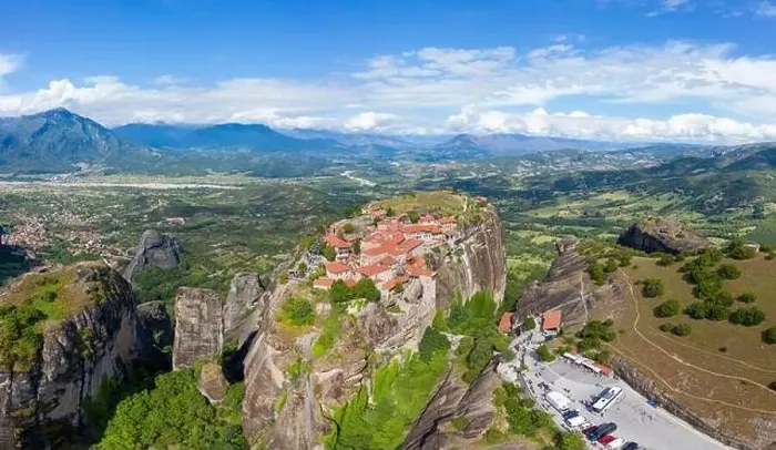 Framed Print : Aerial panorama view of a slide from a drone on a panorama of a mountain range Framed Print : Aerial panorama view of a slide from a drone on a panorama of a mountain range