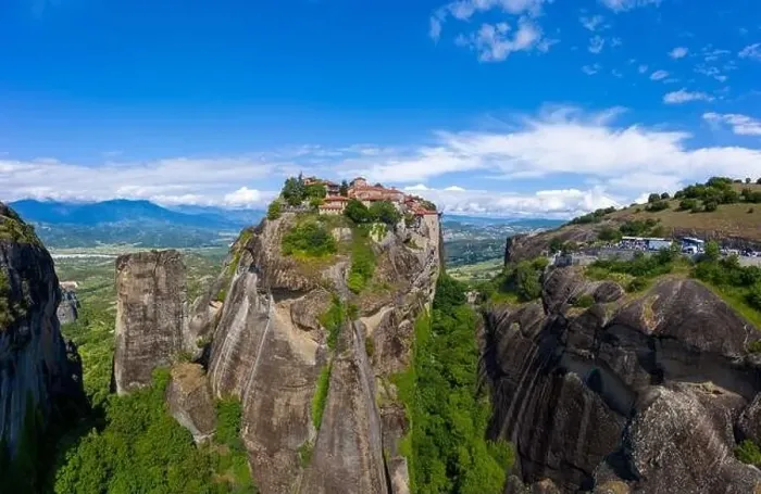 Framed Print : Aerial panorama view of a slide from a drone on a panorama of a mountain range Framed Print : Aerial panorama view of a slide from a drone on a panorama of a mountain range