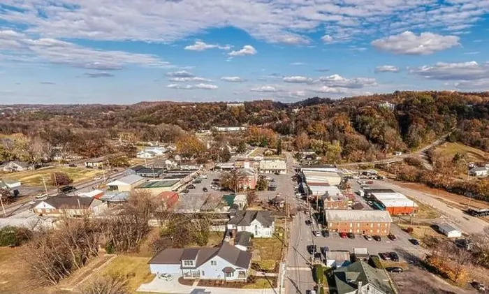 Framed Print : Aerial panorama view of a small southern town square with whiskey barrel houses on the hill Framed Print : Aerial panorama view of a small southern town square with whiskey barrel houses on the hill