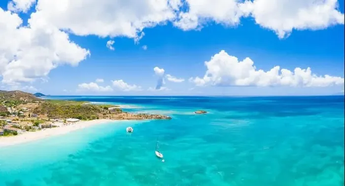 Framed Print : Aerial panoramic by drone of boats in the blue Caribbean Sea approaching to Turners Beach Framed Print : Aerial panoramic by drone of boats in the blue Caribbean Sea approaching to Turners Beach