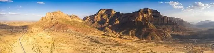 Framed Print : Aerial panoramic by drone of the desert valley at feet of Gheralta Mountains, Hawzen, Tigray Region, Ethiopia, Africa Framed Print : Aerial panoramic by drone of the desert valley at feet of Gheralta Mountains, Hawzen, Tigray Region, Ethiopia, Africa