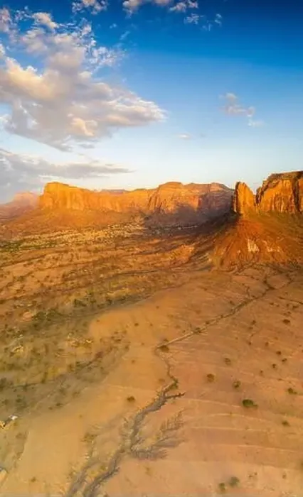 Framed Print : Aerial panoramic by drone of Gheralta Mountains lit by sunset, Hawzen, Tigray Region, Ethiopia, Africa Framed Print : Aerial panoramic by drone of Gheralta Mountains lit by sunset, Hawzen, Tigray Region, Ethiopia, Africa