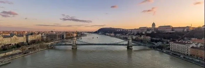 Framed Print : Aerial Panoramic drone shot of chain bridge over Danube river during Budapest sunset time Framed Print : Aerial Panoramic drone shot of chain bridge over Danube river during Budapest sunset time
