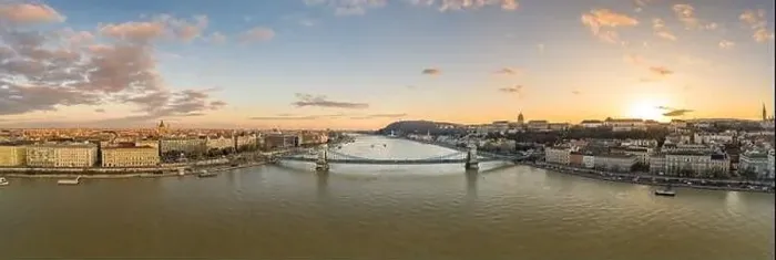 Framed Print : Aerial Panoramic drone shot of chain bridge over Danube river during Budapest sunset time Framed Print : Aerial Panoramic drone shot of chain bridge over Danube river during Budapest sunset time