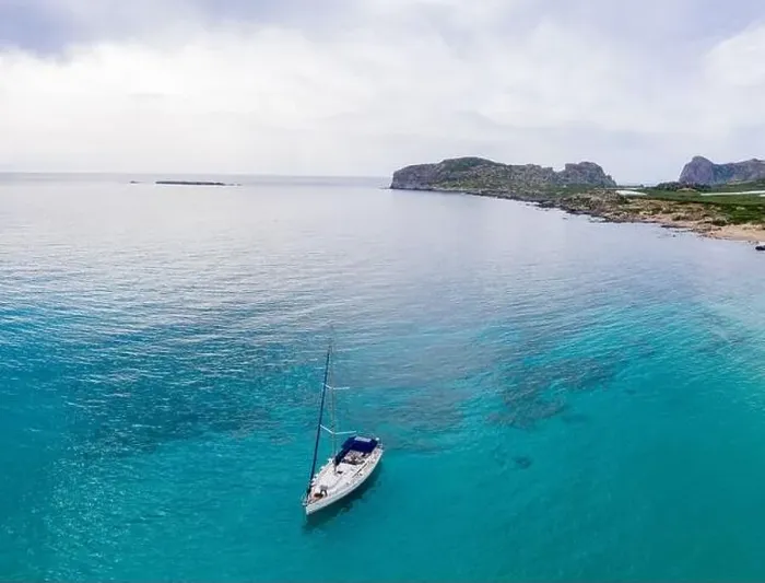 Framed Print : Aerial panoramic drone top view photo of sail boat sailing in mediterranean Aegean island of Crete Greece in summer Framed Print : Aerial panoramic drone top view photo of sail boat sailing in mediterranean Aegean island of Crete Greece in summer