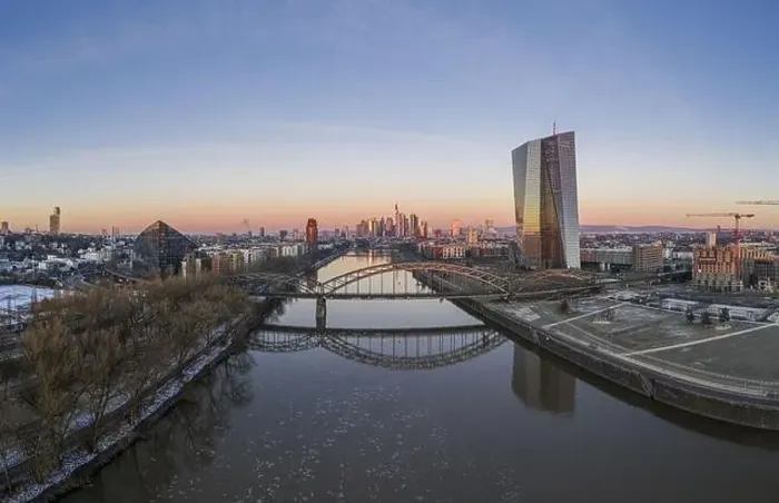 Framed Print : Aerial panoramic picture of Deutschherrnbrücke with Frankfurt skyline during sunrise in winter Framed Print : Aerial panoramic picture of Deutschherrnbrücke with Frankfurt skyline during sunrise in winter