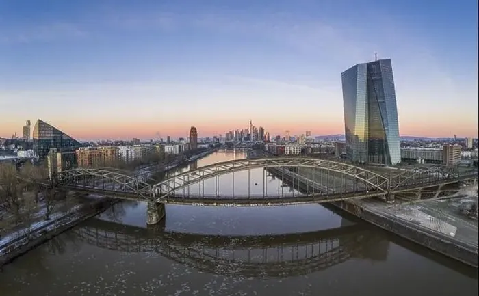 Framed Print : Aerial panoramic picture of Deutschherrnbrücke with Frankfurt skyline during sunrise in winter Framed Print : Aerial panoramic picture of Deutschherrnbrücke with Frankfurt skyline during sunrise in winter