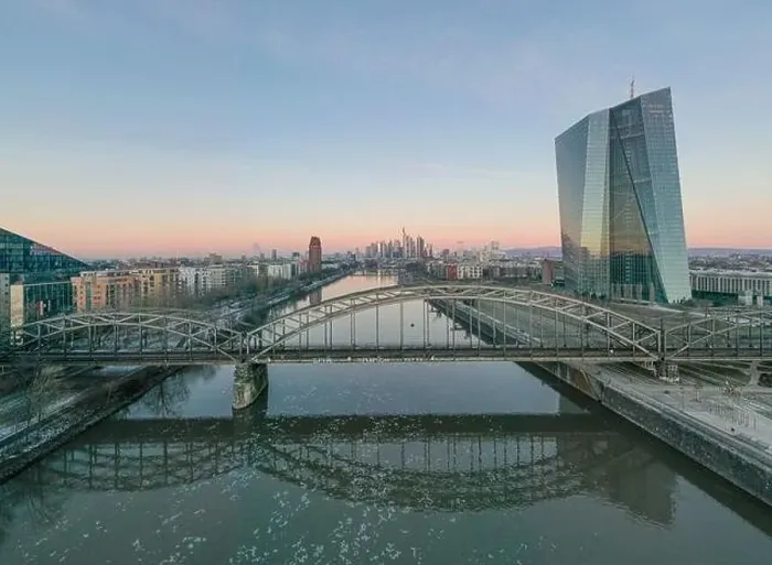 Framed Print : Aerial panoramic picture of Deutschherrnbrücke with Frankfurt skyline during sunrise in winter Framed Print : Aerial panoramic picture of Deutschherrnbrücke with Frankfurt skyline during sunrise in winter