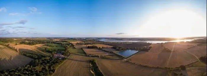 Framed Print : Aerial panoramic of the Suffolk countryside showing a wide range of different agricultural fields that have been Framed Print : Aerial panoramic of the Suffolk countryside showing a wide range of different agricultural fields that have been