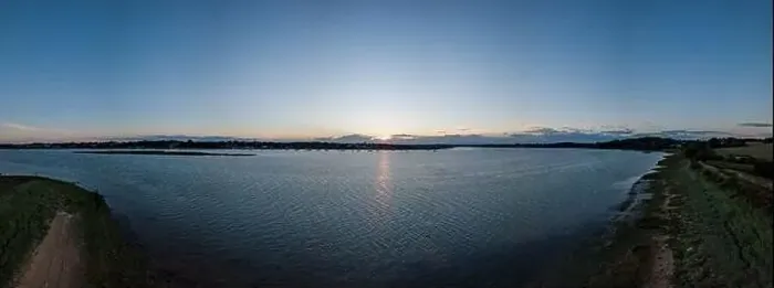 Framed Print : Aerial panoramic of a sunset over the River Deben in Suffolk in the UK Framed Print : Aerial panoramic of a sunset over the River Deben in Suffolk in the UK