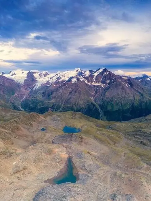 Framed Print : Aerial panoramic of Tresero peak and lake Manzina at sunset Framed Print : Aerial panoramic of Tresero peak and lake Manzina at sunset