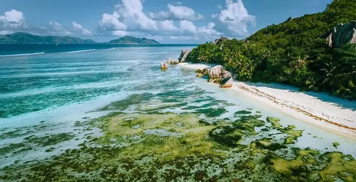 Framed Print : Aerial panoramic view of Anse Source d'Argent beach at La Digue island, Seychelles in the morning light Framed Print : Aerial panoramic view of Anse Source d'Argent beach at La Digue island, Seychelles in the morning light