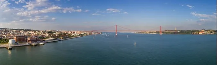 Framed Print : Aerial panoramic view of the city of Lisbon with sail boats on the Tagus River and the 25 of April Bridge Framed Print : Aerial panoramic view of the city of Lisbon with sail boats on the Tagus River and the 25 of April Bridge