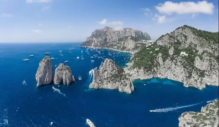Framed Print : Aerial panoramic view of east Capri Island coastline and faraglioni limestone crags in Tyrrhenian sea Framed Print : Aerial panoramic view of east Capri Island coastline and faraglioni limestone crags in Tyrrhenian sea