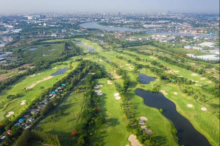 Framed Print : Aerial panoramic view of golf course and houses in city Framed Print : Aerial panoramic view of golf course and houses in city