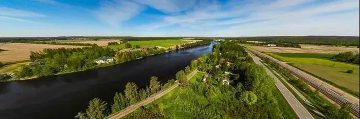 Framed Print : Aerial panoramic view of river Kymijoki bank with beautiful wooden Rabbelugn Manor - Takamaan Kartano