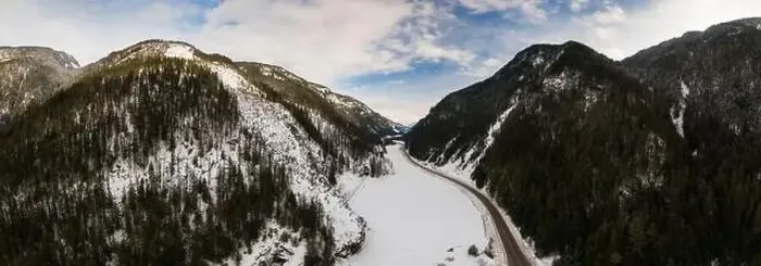 Framed Print : Aerial Panoramic View of a scenic Highway in the valley between Canadian Mountain Landscape in winter Framed Print : Aerial Panoramic View of a scenic Highway in the valley between Canadian Mountain Landscape in winter