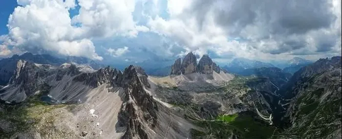 Framed Print : Aerial panoramic view of Tre Cime di Lavaredo mountain during a sunny day with clouds and fog in the Dolomites, Italy Framed Print : Aerial panoramic view of Tre Cime di Lavaredo mountain during a sunny day with clouds and fog in the Dolomites, Italy