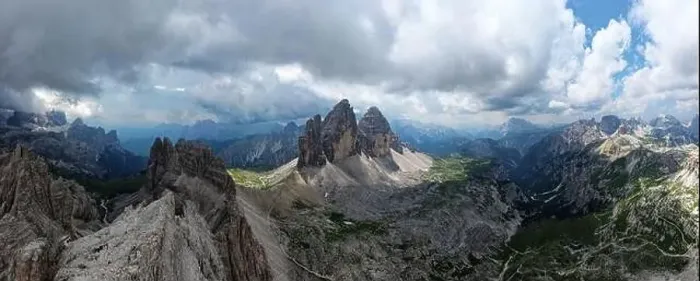 Framed Print : Aerial panoramic view of Tre Cime di Lavaredo mountain during a sunny day with clouds and fog in the Dolomites, Italy Framed Print : Aerial panoramic view of Tre Cime di Lavaredo mountain during a sunny day with clouds and fog in the Dolomites, Italy