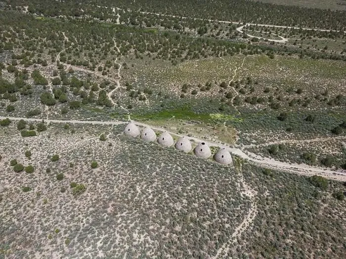 Framed Print : Aerial perspective of the behave shaped charcoal ovens that were used from 1876 to 1897 to make charcoal out of trees Framed Print : Aerial perspective of the behave shaped charcoal ovens that were used from 1876 to 1897 to make charcoal out of trees