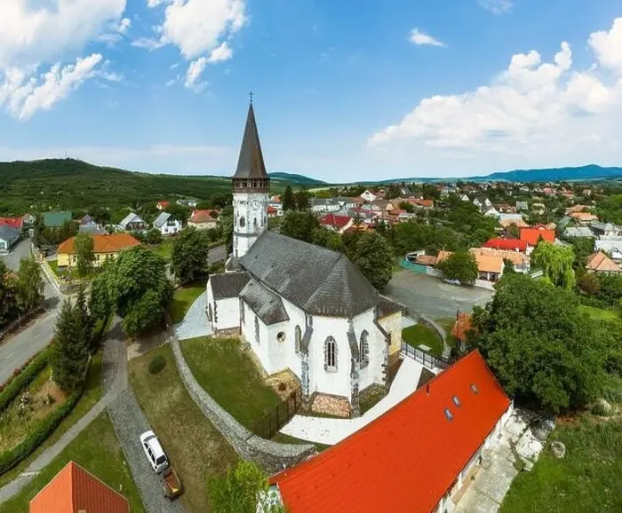 Framed Print : Aerial photo about the Church of the Assumption in Gyongyospata Hungary Framed Print : Aerial photo about the Church of the Assumption in Gyongyospata Hungary