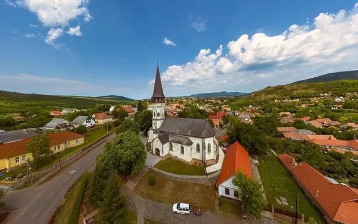 Framed Print : Aerial photo about the Church of the Assumption in Gyongyospata Hungary Framed Print : Aerial photo about the Church of the Assumption in Gyongyospata Hungary