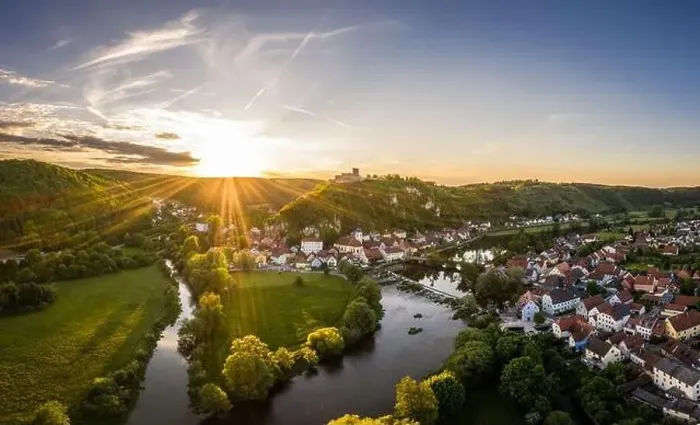 Framed Print : Aerial photo with drone of market Kallmünz Kallmuenz in Bavaria with river Naab and Vils and castle ruin during sunset Framed Print : Aerial photo with drone of market Kallmünz Kallmuenz in Bavaria with river Naab and Vils and castle ruin during sunset