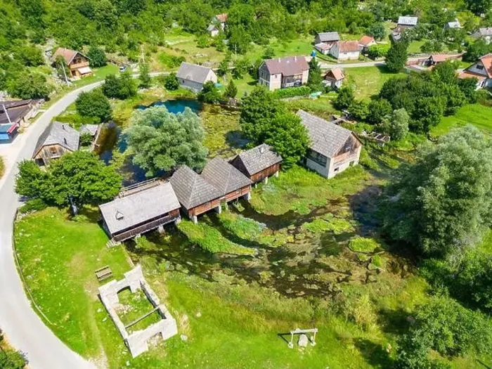 Framed Print : Aerial photo of Majerovo Vrilo, set of wooden mill houses on the source of Gacka river in the village of Sinac, Croatia Framed Print : Aerial photo of Majerovo Vrilo, set of wooden mill houses on the source of Gacka river in the village of Sinac, Croatia