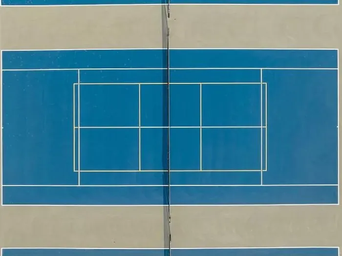 Framed Print : Aerial photo of outdoor blue tennis courts with yellow pickleball lines and gray out of bounds area Framed Print : Aerial photo of outdoor blue tennis courts with yellow pickleball lines and gray out of bounds area