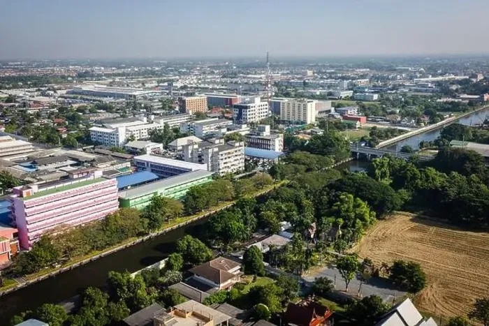 Framed Print : This aerial photograph captures a city surrounded by a river