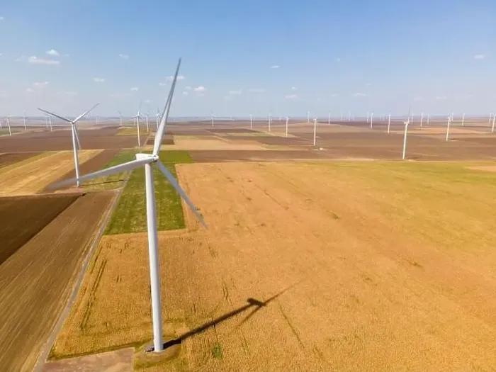 Framed Print : Aerial photography of a wind turbine from a wind farm in country side Framed Print : Aerial photography of a wind turbine from a wind farm in country side