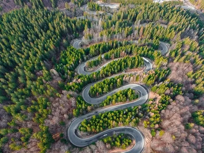 Framed Print : Aerial photography of a winding road in the mountains with serpentines and curves Framed Print : Aerial photography of a winding road in the mountains with serpentines and curves