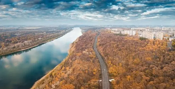 Framed Print : Aerial scenic panorama of railroad at city suburbs. Majestic sunset clouds reflecting in the river waters Framed Print : Aerial scenic panorama of railroad at city suburbs. Majestic sunset clouds reflecting in the river waters