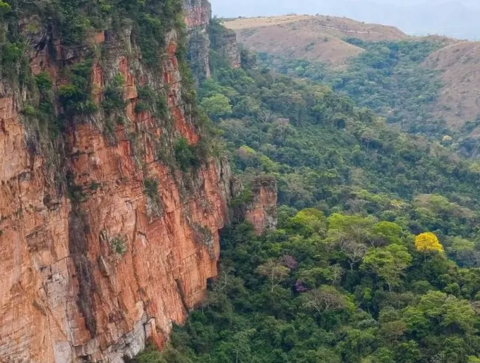 Framed Print : Aerial shot of red cliffs and lush green rainforest in Chapada dos Guimarães, Brazil Framed Print : Aerial shot of red cliffs and lush green rainforest in Chapada dos Guimarães, Brazil