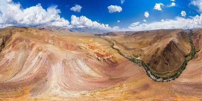 Framed Print : Aerial shot of the textured yellow nad red mountains resembling the surface of Mars Framed Print : Aerial shot of the textured yellow nad red mountains resembling the surface of Mars