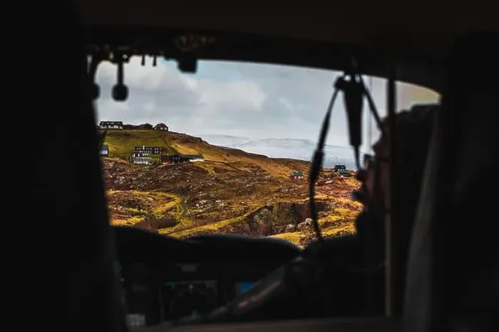 Framed Print : Aerial shot of the town Torshavn taken from the inside of a helicopter during a flight over the Faroe Islands with Framed Print : Aerial shot of the town Torshavn taken from the inside of a helicopter during a flight over the Faroe Islands with