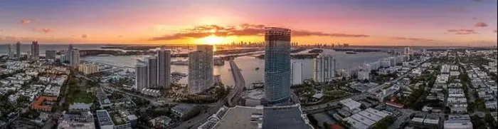 Framed Print : Aerial sunset of Miami Beach luxury sky scraper condo complex with colorful sky Framed Print : Aerial sunset of Miami Beach luxury sky scraper condo complex with colorful sky